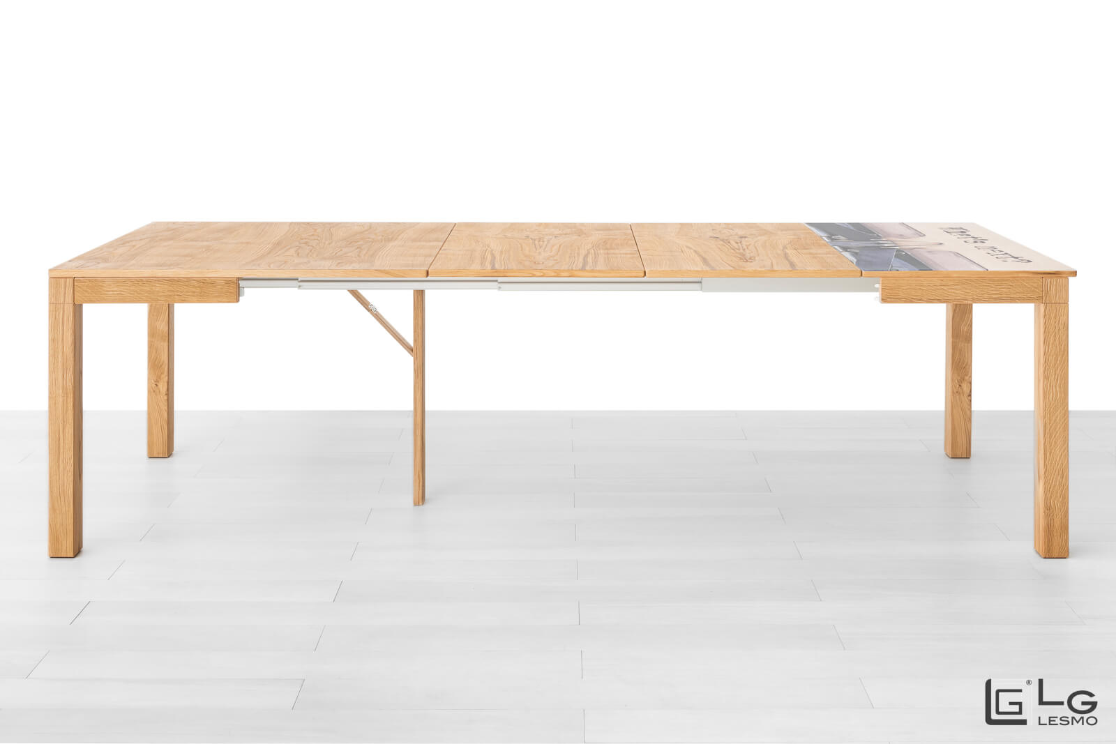 EXTENDABLE TABLE<br>Finish: Raw Oak<br>up to 12 seats