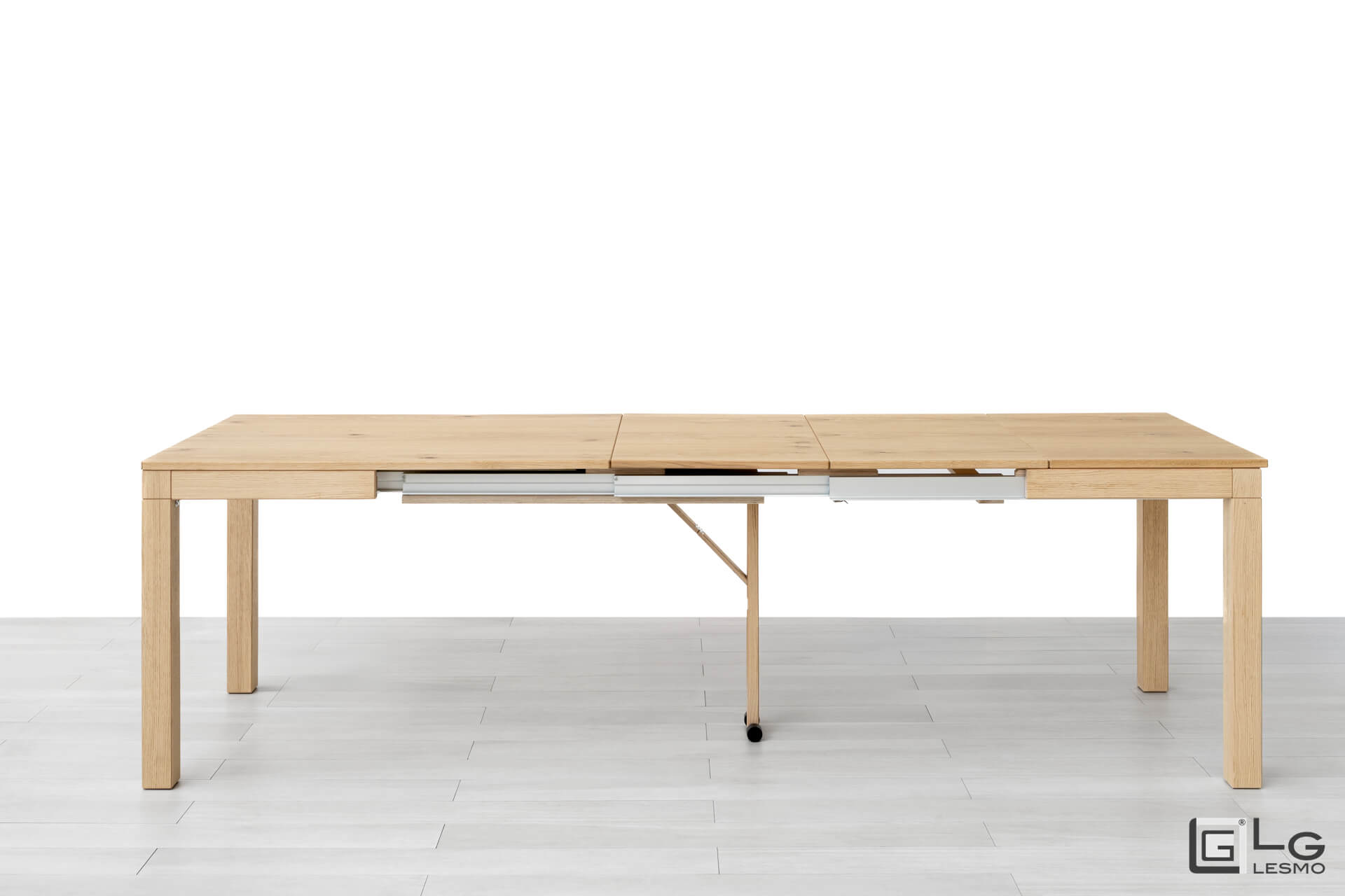 EXTENDABLE TABLE<br>Finish: Raw Oak<br>up to 12 seats