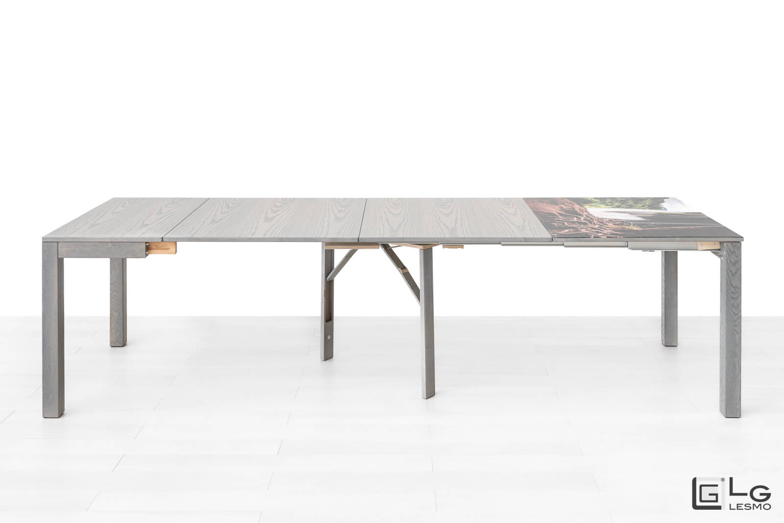 CONSOLLE ALLUNGABILE<br>Finitura: Frassino Nuvola<br>Posti a sedere: Fino a 14