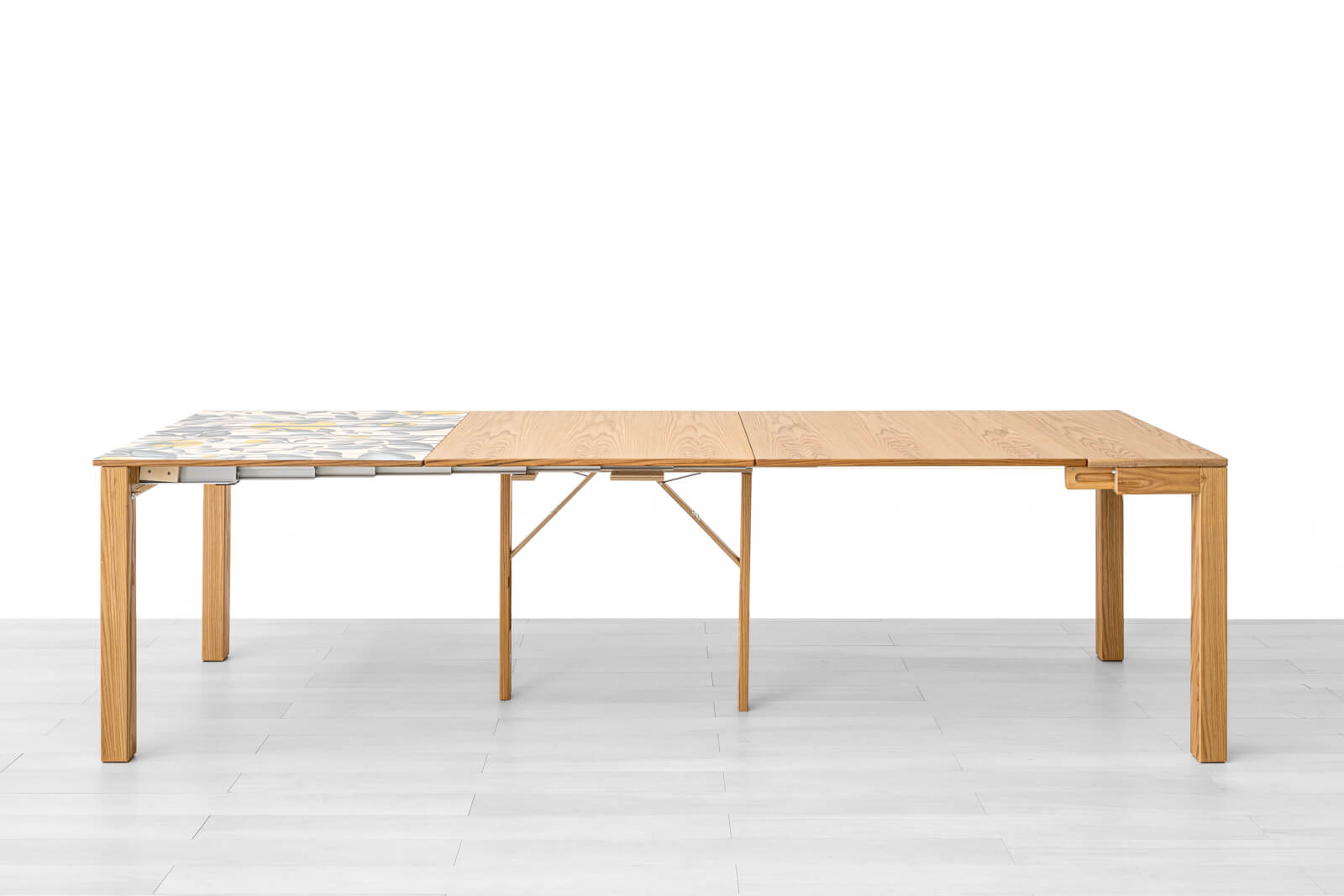 CONSOLLE ALLUNGABILE<br>Finitura: Olmo<br>Fino a 12 posti